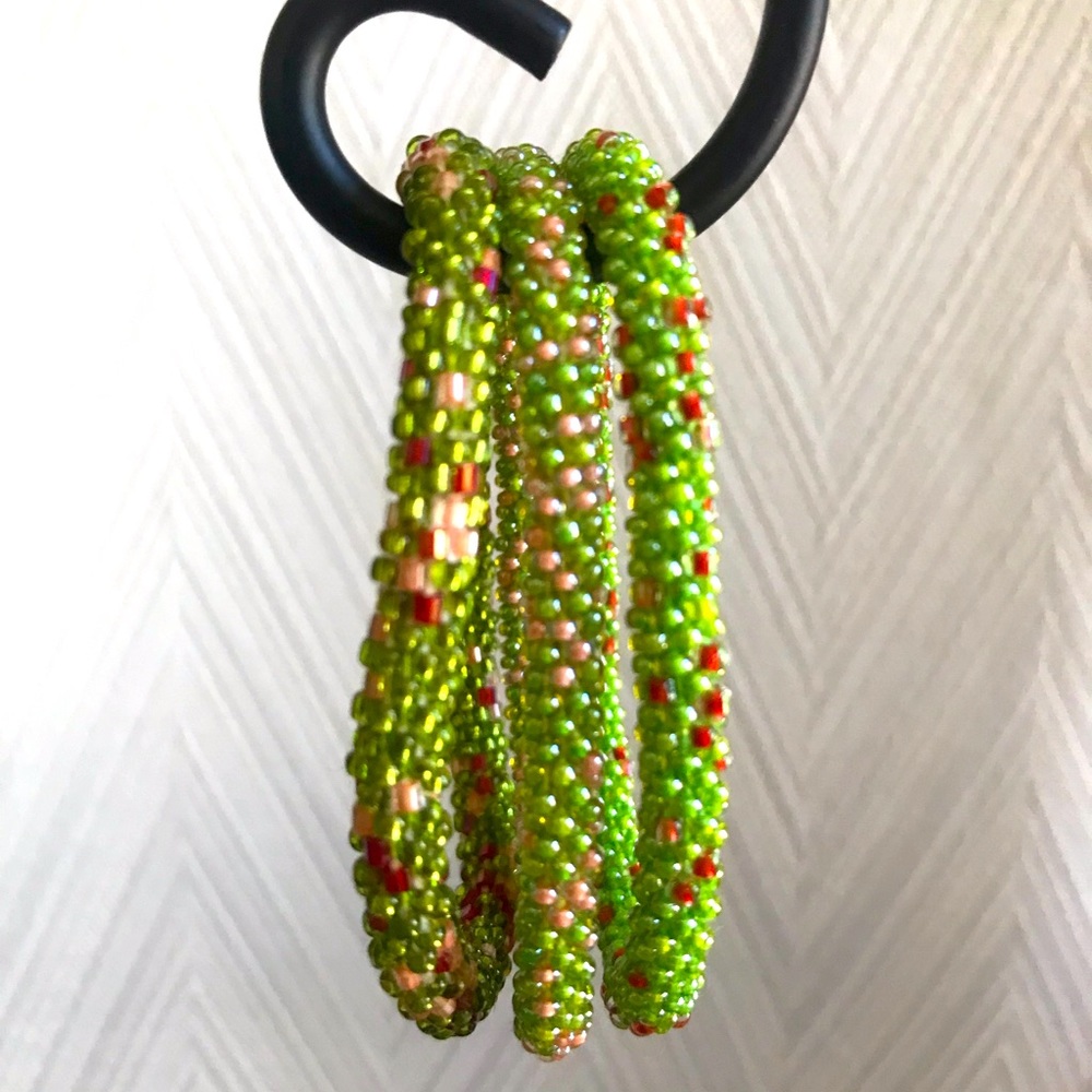 Aid Through Trade roll on bracelets
